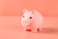 A Pink Piggy Bank on Pink Background Royalty Free Stock Photo