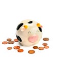 Pink piggy bank and coins,  on white background Royalty Free Stock Photo