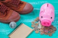 Pink piggy bank over coins stack, saving money Royalty Free Stock Photo