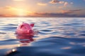 Pink piggy bank sinking into the drain. Royalty Free Stock Photo