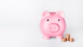 Piggy bank and stacks of coins. Money saving concept Royalty Free Stock Photo