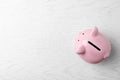 Pink piggy bank on table Royalty Free Stock Photo