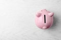 Pink piggy bank on table Royalty Free Stock Photo