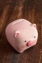 Pink piggy bank on a table