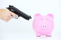 Pink piggy and gun Royalty Free Stock Photo