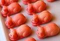 Pink pigs as marzipan deserts