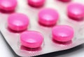 Pink pills in blister pack Royalty Free Stock Photo