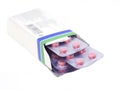 Pink pills in a package isolated on a white background Royalty Free Stock Photo