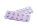 Pink pills in a package isolated on a white background Royalty Free Stock Photo