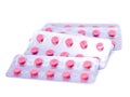 Pink pills in a package isolated on a white background Royalty Free Stock Photo