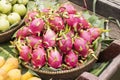 Pink pitahaya dragon fruit in basket