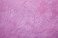 Pink plaster background - uneven rough surface
