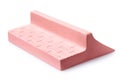 Pink plaster ramp with two sides for fingerboarding, isolated on a white background