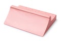 Pink plaster ramp with two sides for fingerboarding, isolated on a white background