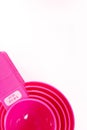 Pink plastic baking utensils Royalty Free Stock Photo