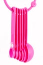 Pink plastic baking utensils Royalty Free Stock Photo