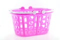 Pink plastic basket isolated. Royalty Free Stock Photo