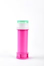 Pink plastic bottle of bubbles. Royalty Free Stock Photo