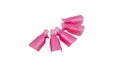 Pink plastic caps, clips for reusable nails UV gel polish isolated on a white background. Royalty Free Stock Photo