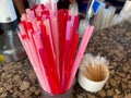 Pink plastic drinking straws in blue disposable paper cup. Cafe, fun happy vacation, summer cocktail party, poster banner design, Royalty Free Stock Photo