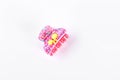 Pink plastic hair clip on white background. Royalty Free Stock Photo