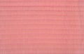 Pink pleated transparent caprone cloth as background texture