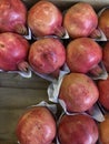 Pink pomegranates on the market Royalty Free Stock Photo