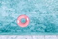 Pink pool float in blue water