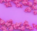 Pink popcorn on purple paper background. Fashion pop art style. Top view. Royalty Free Stock Photo