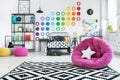 Pink pouf in colorful bedroom Royalty Free Stock Photo