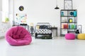 Pink pouf in kid`s room