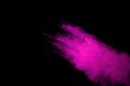 Pink powder explosion on black background. Colored cloud. Colorful dust explode. Paint Holi Royalty Free Stock Photo