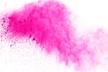 Pink powder explosion isolate on white background. Paint Holi. Royalty Free Stock Photo