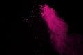 Pink powder explosion isolate on white background. Paint Holi. Royalty Free Stock Photo