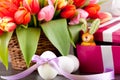 Pink present and colorful tulips festive easter decoration Royalty Free Stock Photo