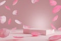 Pink product podium placement on solid background with rose petals falling. Luxury premium beauty, fashion, cosmetic and spa gift