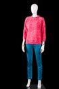 Pink pullover with tuquoise pants.