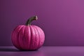 Pink pumpkin on a violet background