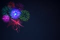 Pink purpe blue green fireworks over night sky Royalty Free Stock Photo