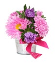 Pink and purple aster flowers in a small metal bucket Royalty Free Stock Photo