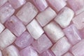 Pink purple background of natural stones. Kunzite is a natural p Royalty Free Stock Photo