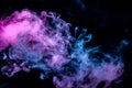 Of Pink Purple And Blue Wavy Smoke On A Black Isolated Background. Abstract Pattern Of Steam From Vape Of Rising Clouds