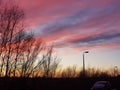 Pink and purple sunset sky over river Ouse