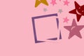 pink-purple frame as copy space on a pink background, colorful stars in the corner, creative modern design Royalty Free Stock Photo