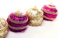 Pink and purple and gold Christmas balls in snow with tinsel, christmas background Royalty Free Stock Photo