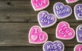 Pink and purple heart shaped conversation cookies