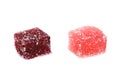 Pink and purple jelly candy pieces isolated on a white surface Royalty Free Stock Photo