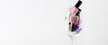 Pink, purple nail polish bottles set. Nail polish bottles in wine glass. Advertising banner. Banner ad