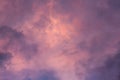 Pink, purple, orange golden glow of clouds at sunset against blue sky ideal as nature background Royalty Free Stock Photo