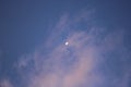 Pink and purple sky with half moon at dusk Royalty Free Stock Photo